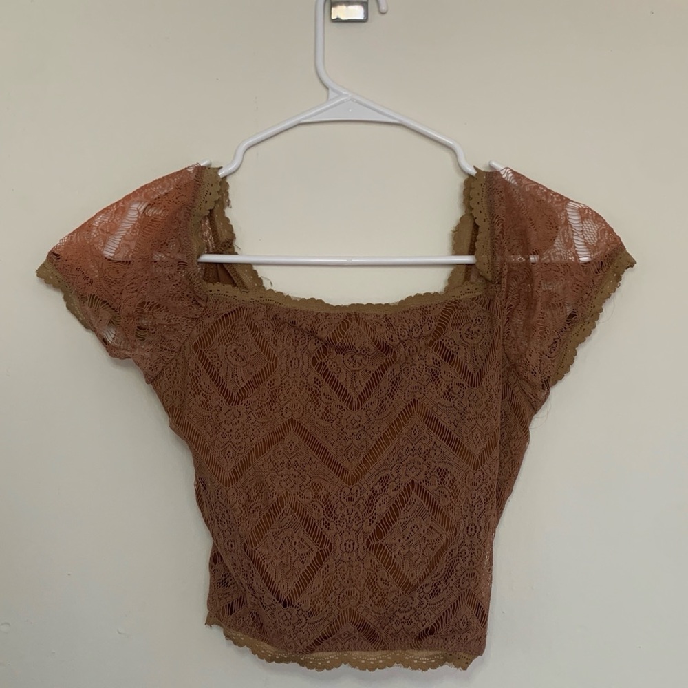Small, short, brown top - very much hippy/indie vibes (styled in last pic)